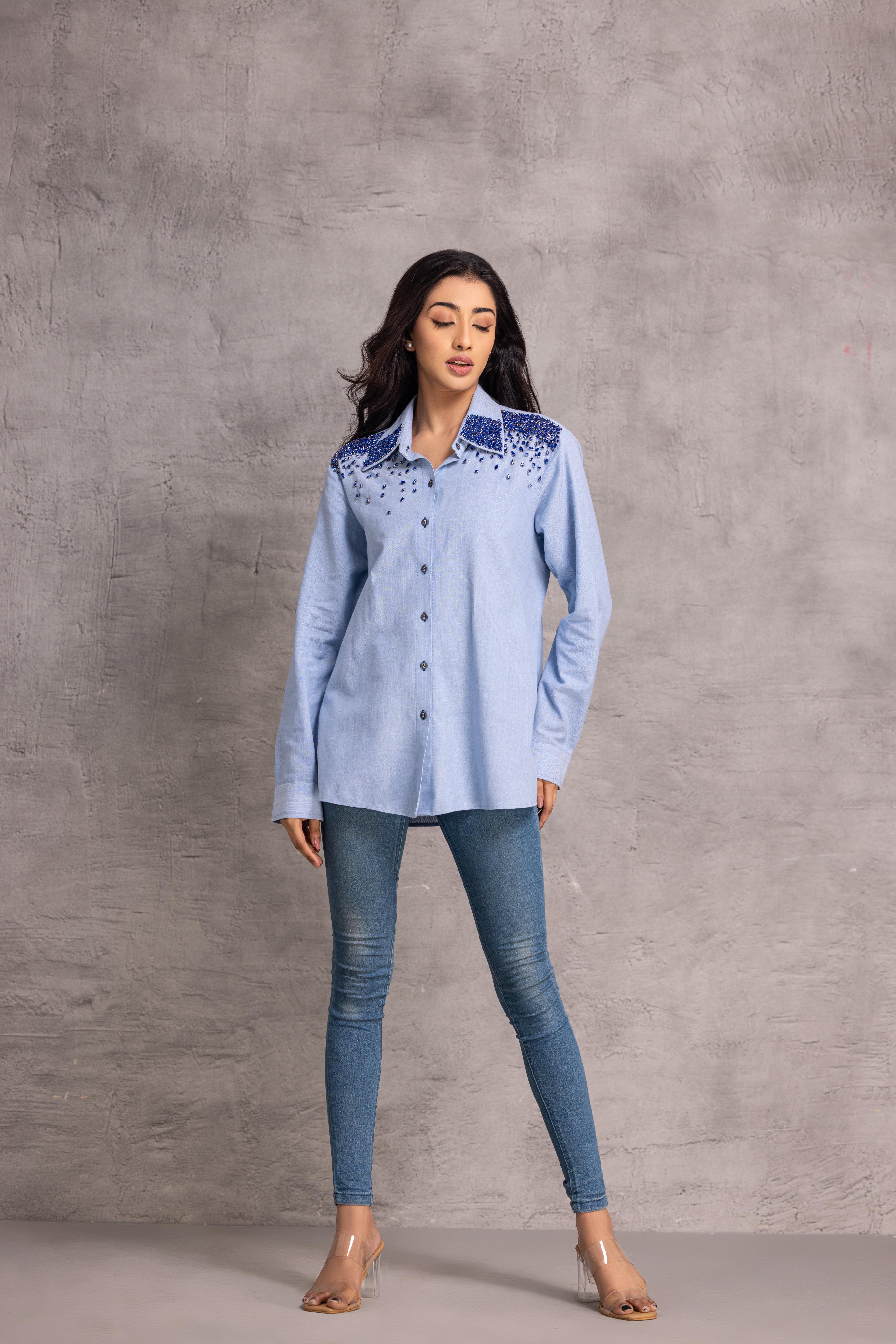 Blue chambray shirt with stone detailing to enhance the overall