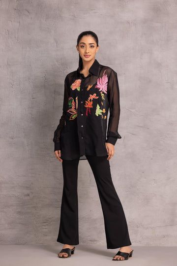 Black Organza loose-fit shirt with a sheer finish and patchwork floral motifs, creating an elegant and joyful look