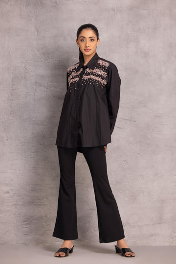 Black cotton  shirt with stone detailing  to enhance the overall look.