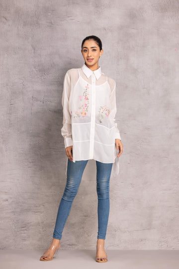 White Organza loose-fit shirt with a sheer finish and patchwork floral motifs, creating an elegant and joyful look